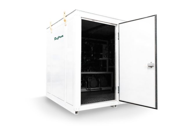 Industrial liquid cooled chiller for refrigeration systems manufactured by Refra in a white walk in container with open door